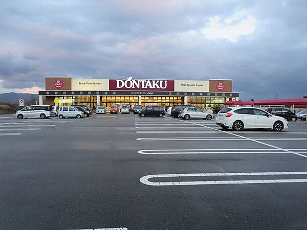 ファミリーマート高松中央店 どんたくかほく店様まで車で6分(2700ｍ) 1000m