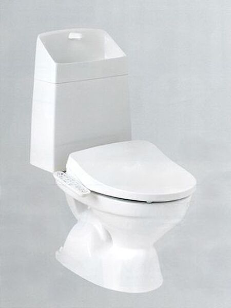 （同仕様写真）トイレは天井・壁のクロスを貼り替え、床をクッションフロア貼りにします。温水洗浄付き便器に交換も行い清潔に仕上げます。