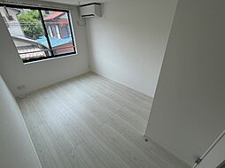 丘の上のフルール 302 3階1Kのリビング/ダイニング