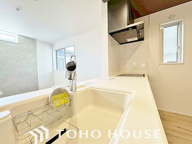 浄水器ボタンひとつで浄水と原水に切り替えられる浄水器一体型水洗を使用。