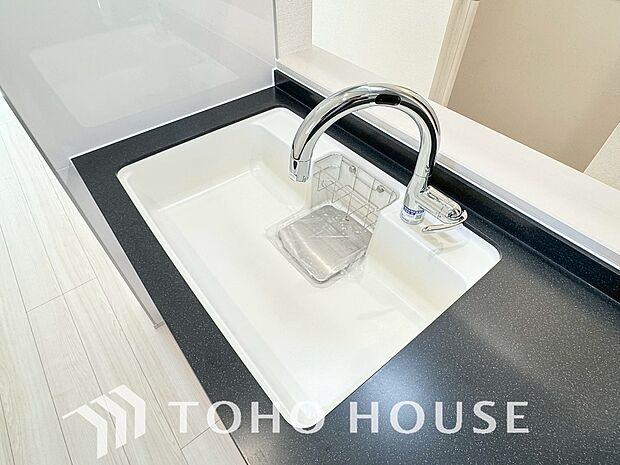 浄水器ボタンひとつで浄水と原水に切り替えられる浄水器一体型水洗を使用。