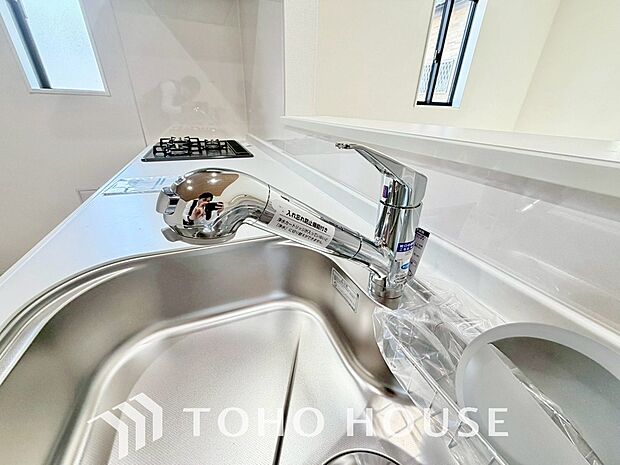 浄水器ボタンひとつで浄水と原水に切り替えられる浄水器一体型水洗を使用。