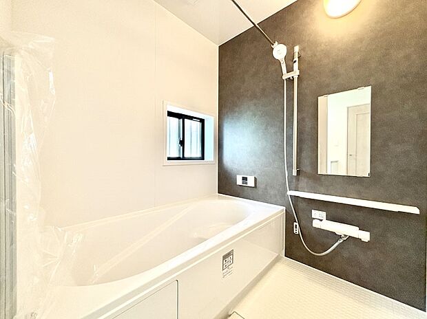 落ち着いた雰囲気でゆっくりお寛ぎいただけるバスルーム