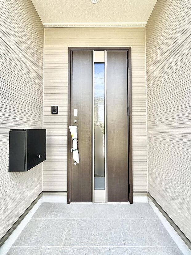 大切な家族、来客を出迎える玄関。