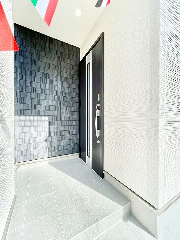 大切な家族、来客を出迎える玄関。