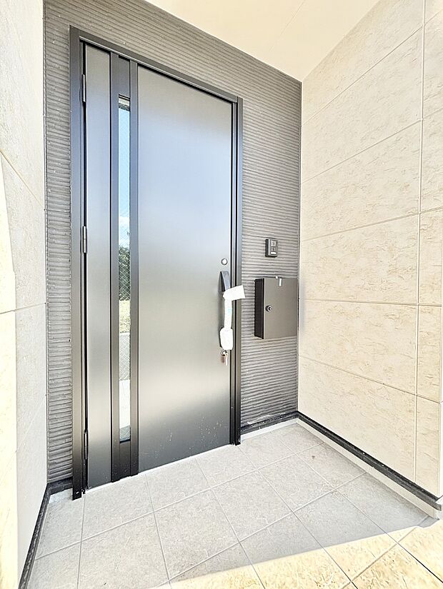 大切な家族、来客を出迎える玄関。