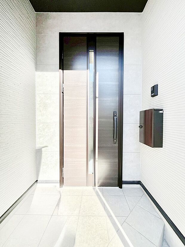 大切な家族、来客を出迎える玄関