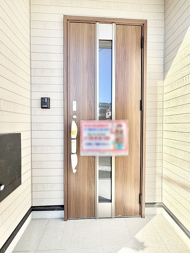 大切な家族、来客を出迎える玄関。