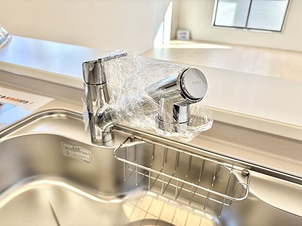 いつでも清潔なおいしいお水を。一つの水栓で水道水と浄水を使い分け。