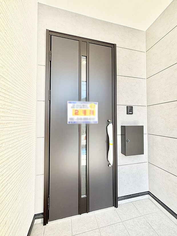 大切な家族、来客を出迎える玄関。