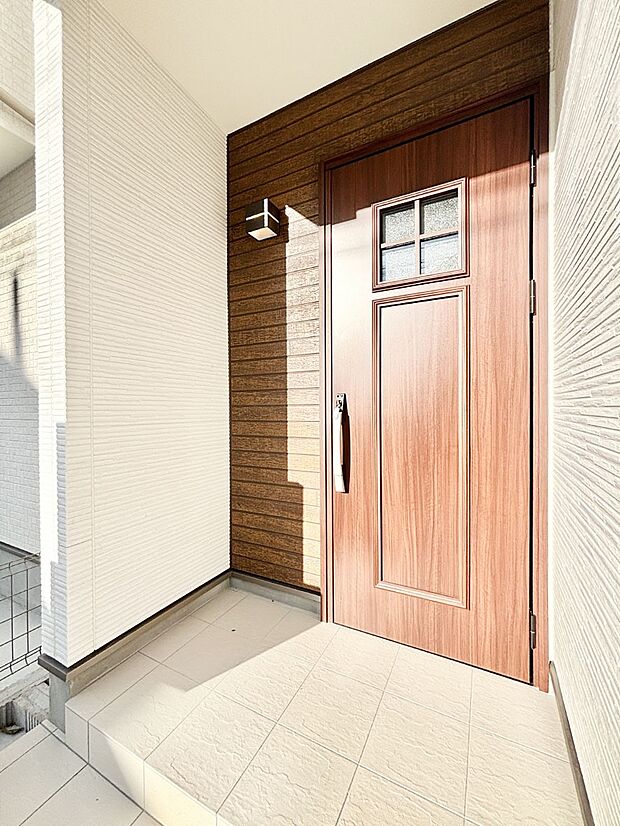 大切な家族、来客を出迎える玄関。