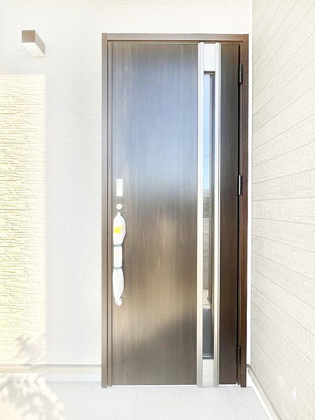 大切な家族、来客を出迎える玄関。