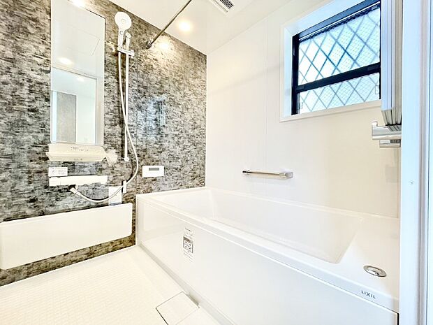 落ち着いた雰囲気でゆっくりお寛ぎいただけるバスルーム