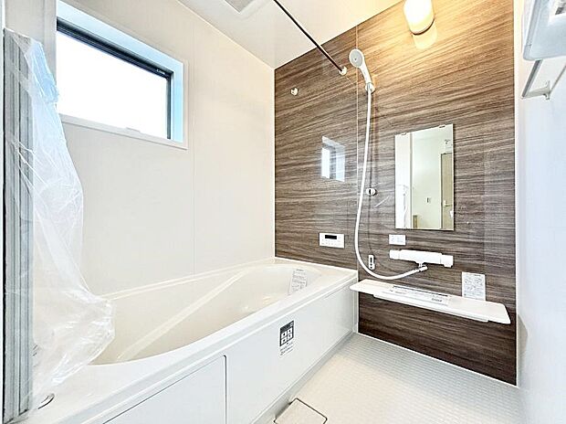 落ち着いた雰囲気でゆっくりお寛ぎいただけるバスルーム