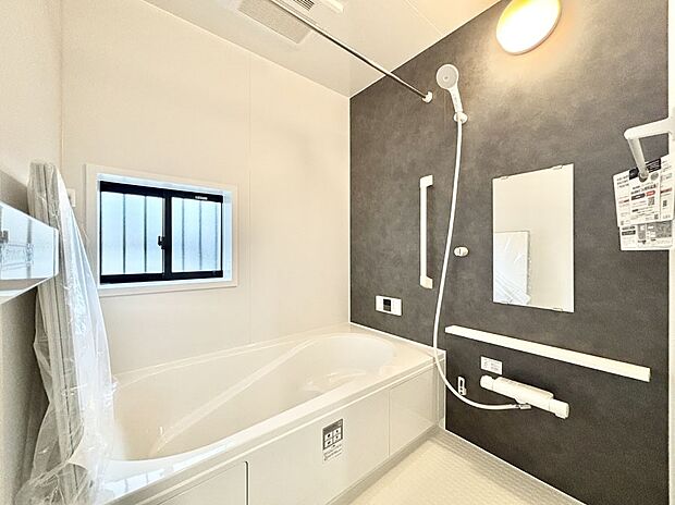 落ち着いた雰囲気でゆっくりお寛ぎいただけるバスルーム