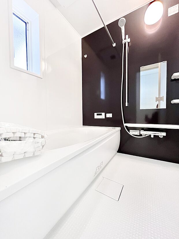 落ち着いた雰囲気でゆっくりお寛ぎいただけるバスルーム