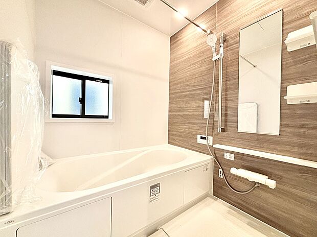 落ち着いた雰囲気でゆっくりお寛ぎいただけるバスルーム