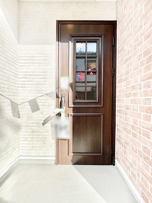 大切な家族、来客を出迎える玄関