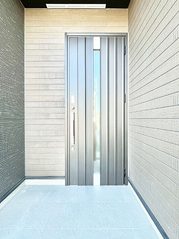 大切な家族、来客を出迎える玄関