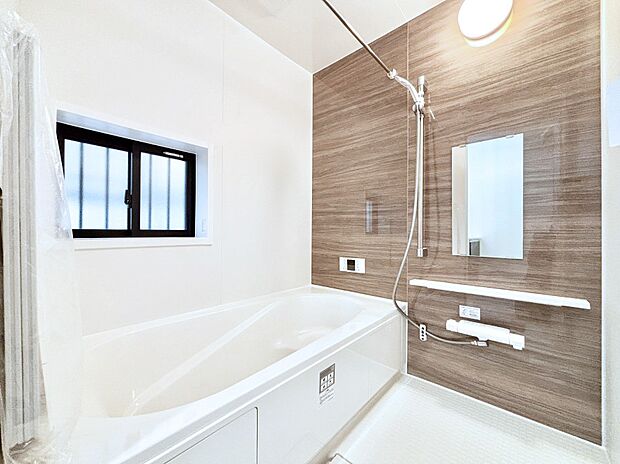 落ち着いた雰囲気でゆっくりお寛ぎいただけるバスルーム