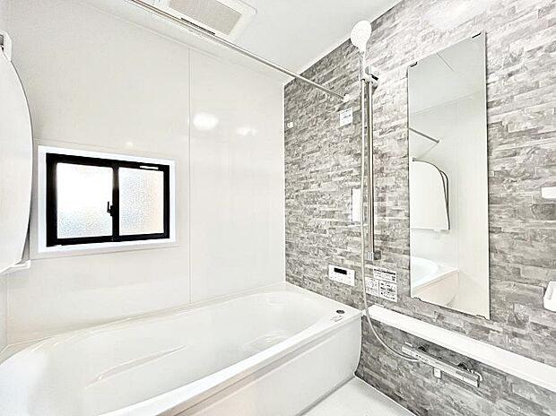 落ち着いた雰囲気でゆっくりお寛ぎいただけるバスルーム