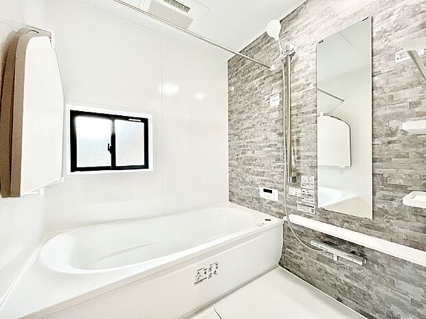 落ち着いた雰囲気でゆっくりお寛ぎいただけるバスルーム