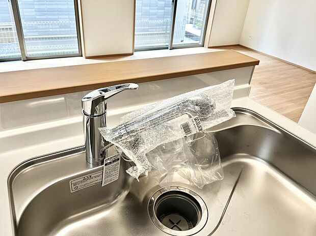 いつでも清潔なおいしいお水を。一つの水栓で水道水と浄水を使い分け。