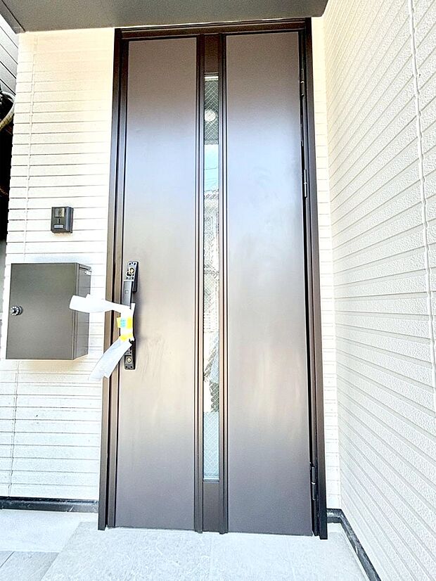 大切な家族、来客を出迎える玄関。