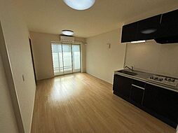 コーセー飯田 2階1LDKのリビング/ダイニング