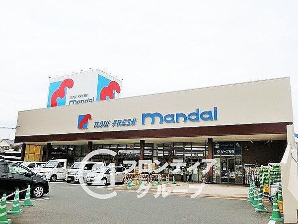 万代香里西店 徒歩9分。 680m