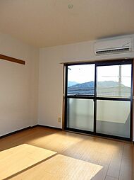 ゴールデンヒルズモリナオII 202 2階1Kのリビング/ダイニング