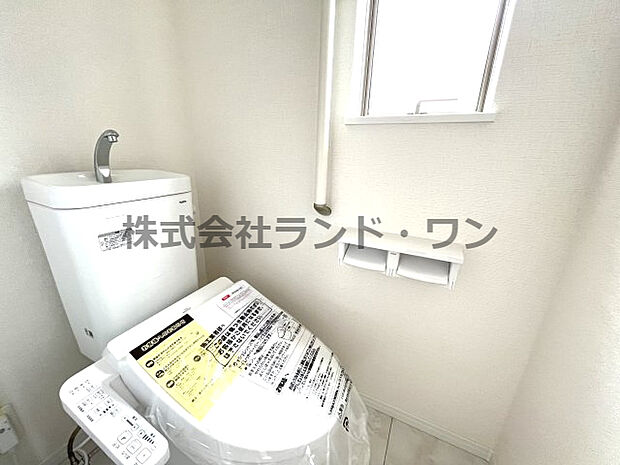 □1階温水洗浄便座付きトイレ
