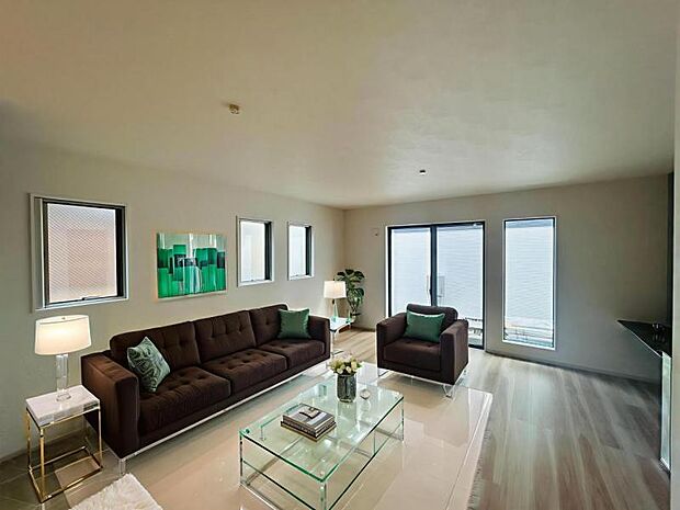 【2号棟：LDK】明るい光と風が交差する大空間は約18帖。キッチンスペースとの一体感も考えた空間になりました。※家具等はCG合成となります。