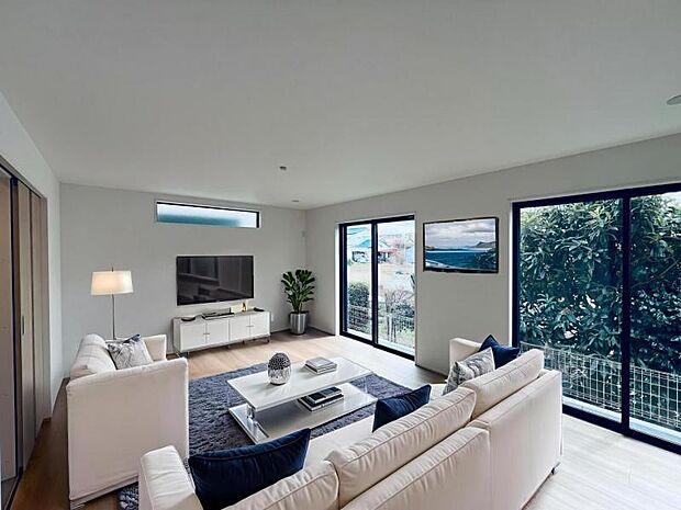 【リビング】明るい光と風が交差する大空間は約19.25帖。キッチンスペースとの一体感も考えた空間になりました。