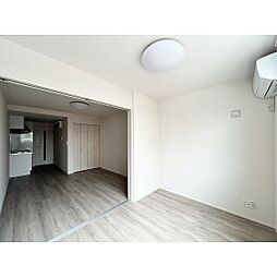 ＵＮ富沢 1階1LDKのリビング/ダイニング