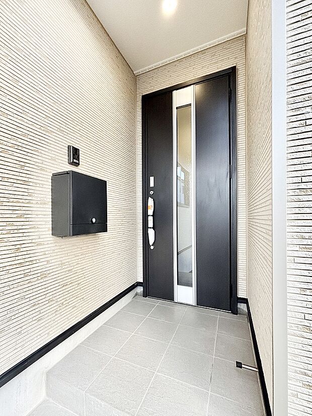 大切な家族、来客を出迎える玄関。