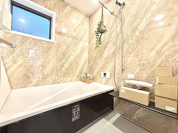 落ち着いた雰囲気でゆっくりお寛ぎいただけるバスルーム