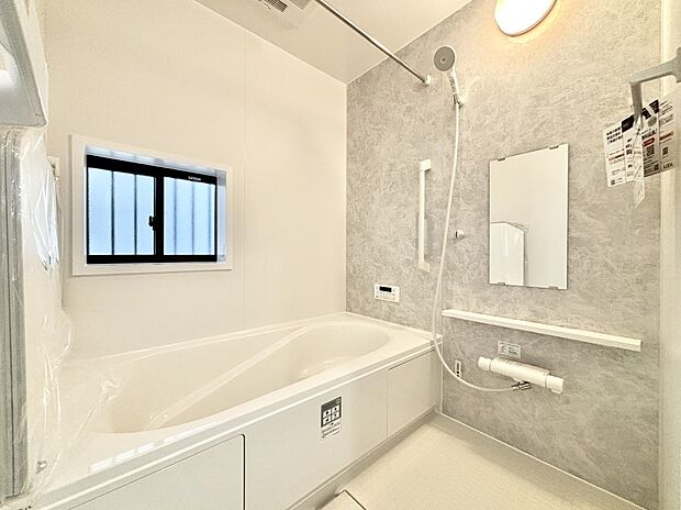 落ち着いた雰囲気でゆっくりお寛ぎいただけるバスルーム