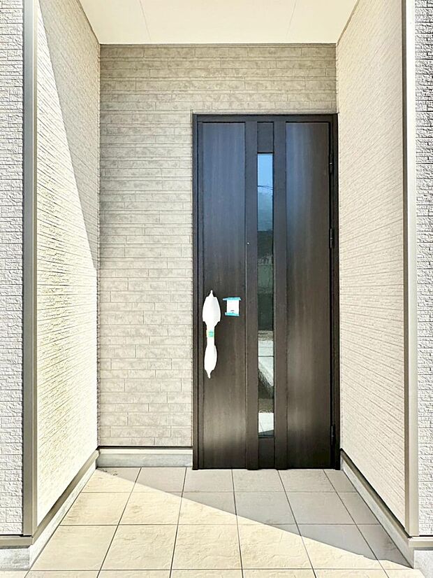 大切な家族、来客を出迎える玄関。