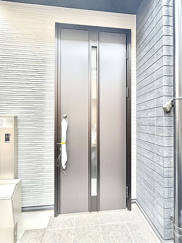 大切な家族、来客を出迎える玄関。