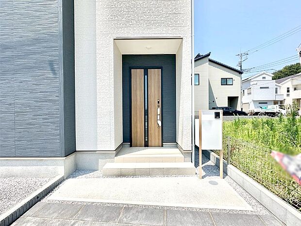 大切な家族、来客を出迎える玄関。