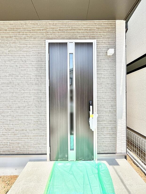 大切な家族、来客を出迎える玄関。
