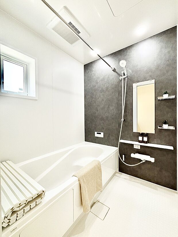 落ち着いた雰囲気でゆっくりお寛ぎいただけるバスルーム