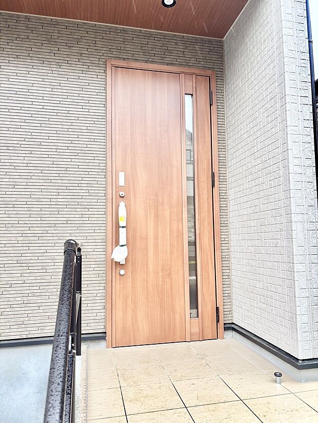 大切な家族、来客を出迎える玄関。