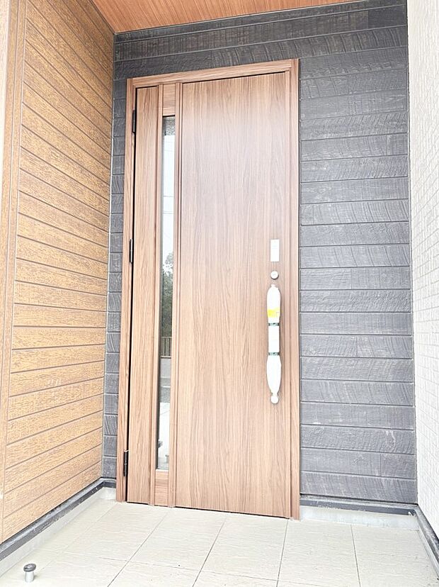 大切な家族、来客を出迎える玄関。