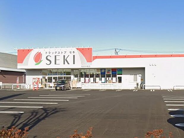 ドラッグストア 600m ドラッグストアセキ松伏中央店