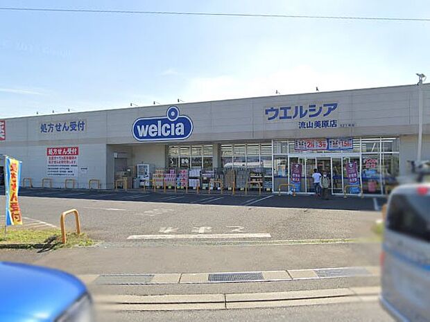 ドラッグストア 900m ウエルシア流山美原店