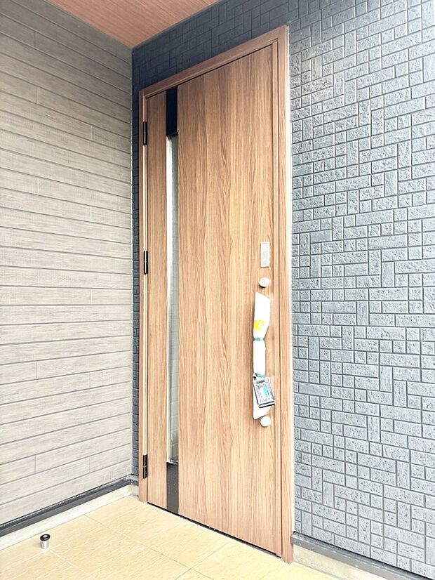 大切な家族、来客を出迎える玄関。