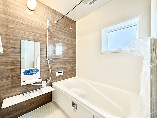 落ち着いた雰囲気でゆっくりお寛ぎいただけるバスルーム