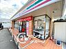 周辺：セブンイレブン生駒元町1丁目店 徒歩11分。 880m